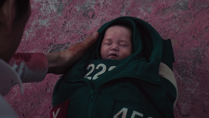Il bambino, simbolo di innocenza, speranza e futuro.