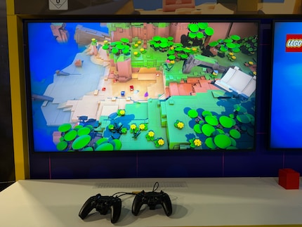 In Lego Voyagers, two of me stroll through a beautiful world as Lego bricks.
