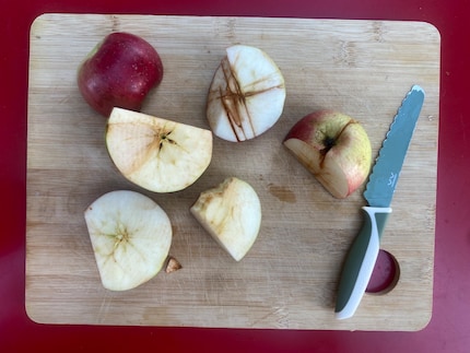 Only children can cut apples this skilfully.
