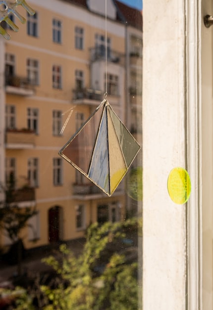 Handmade stained glass looks like a floating work of art that makes the room come alive.
