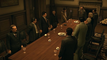 Consiglio di famiglia in «Mafia II»: qui la mafia veniva rappresentata come una società rigidamente organizzata, in contrasto con il potere informale dei clan siciliani.