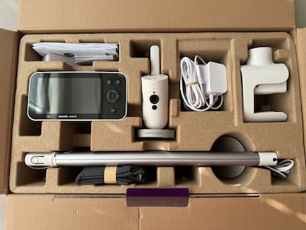 The camera’s extensive accessories arrive neatly organised. I download the user manual to my phone using the QR code.